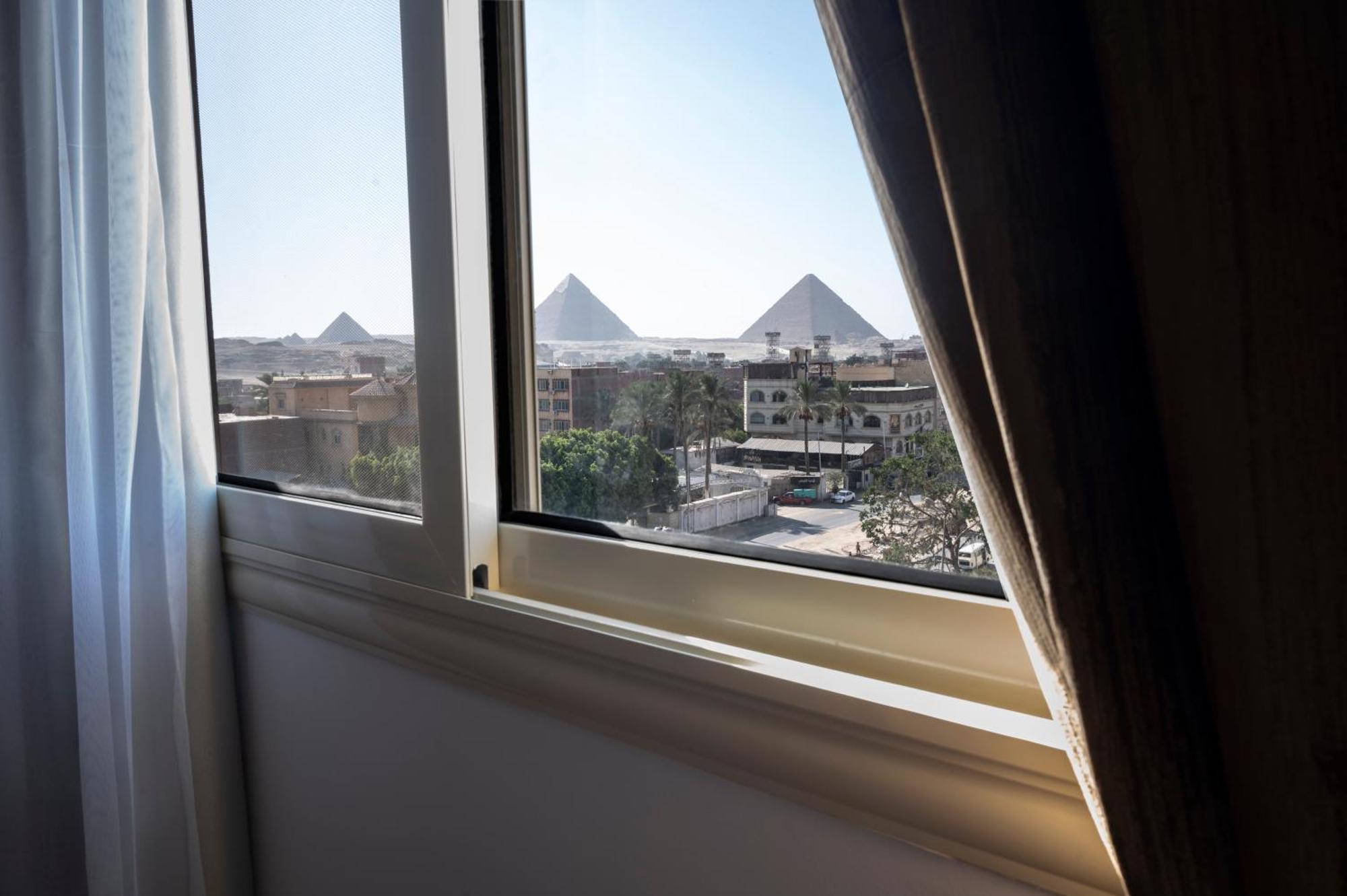 Palm Pyramids View Hotel Kafret el-Gabal Camera foto